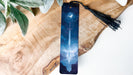 a bookmark with a picture of a cross on it