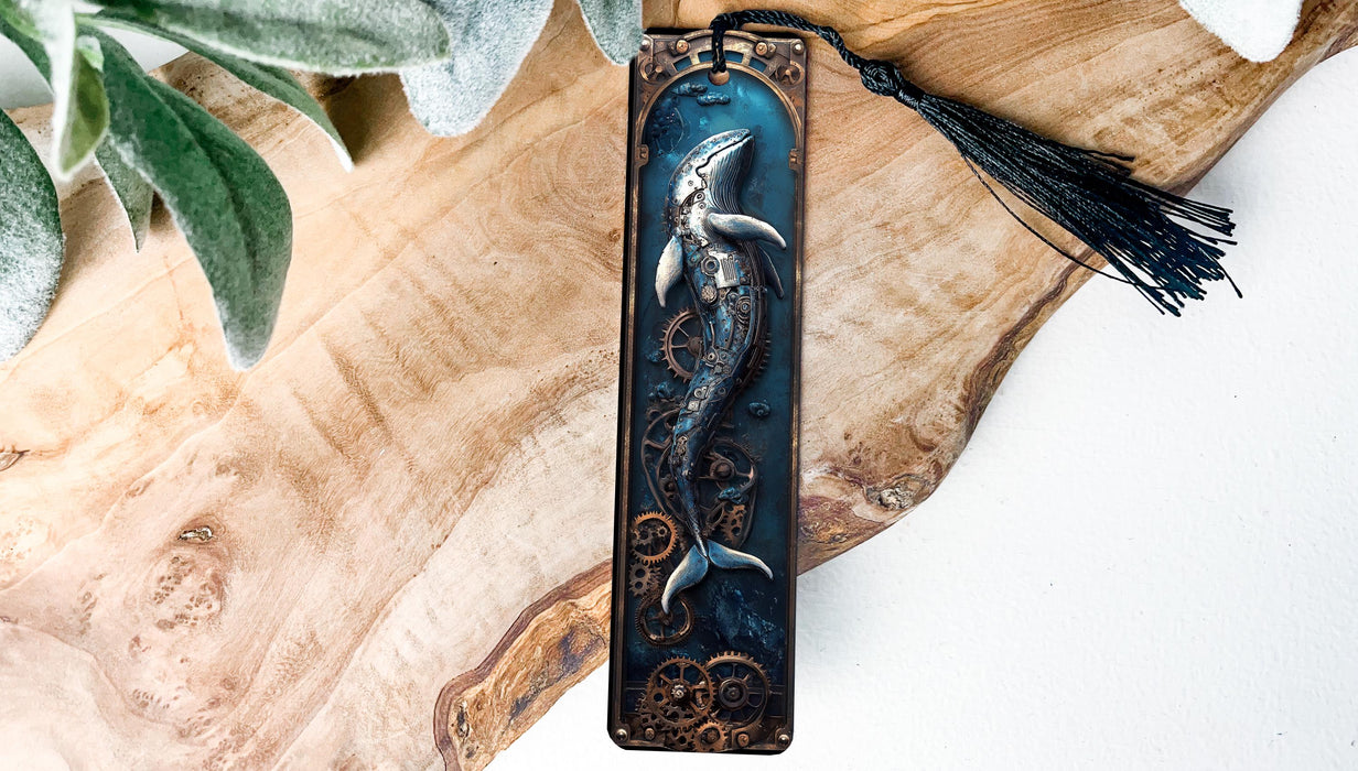 a wooden plaque with a mermaid on it
