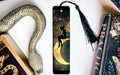 a bookmark with a fairy sitting on top of it