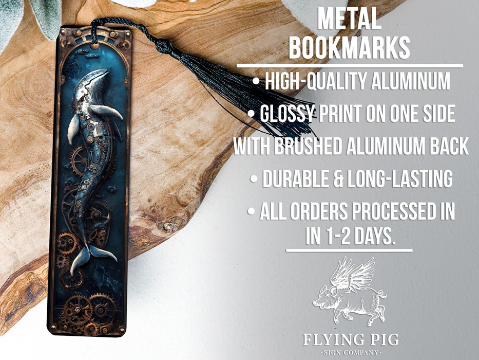 a metal bookmark with a mermaid on it