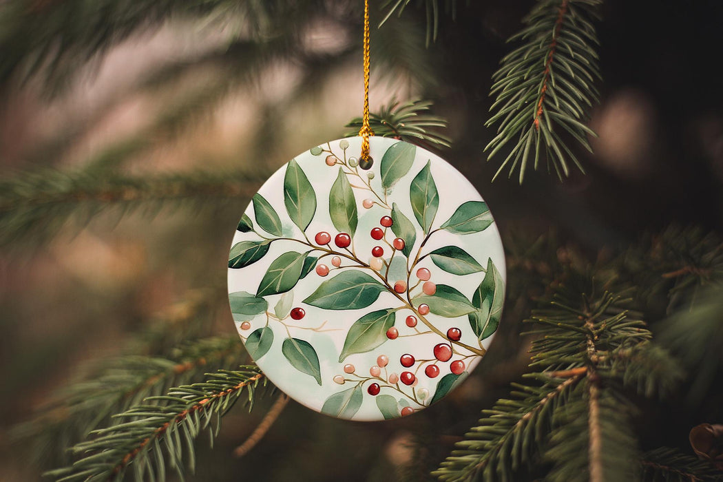 a ceramic ornament hanging from a christmas tree