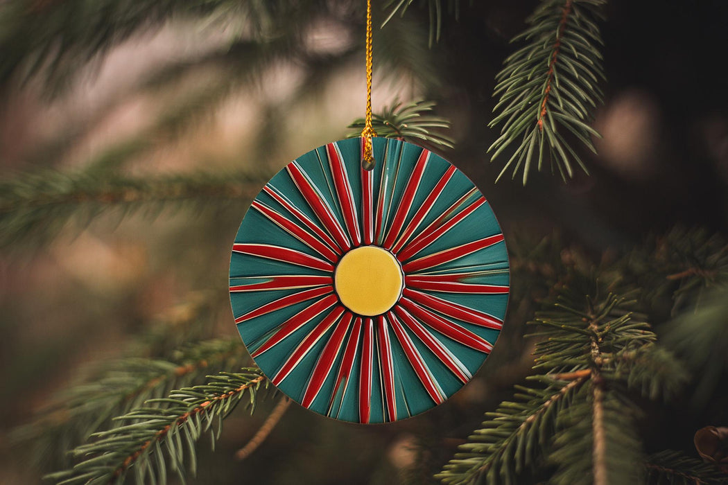 a christmas ornament hanging from a christmas tree