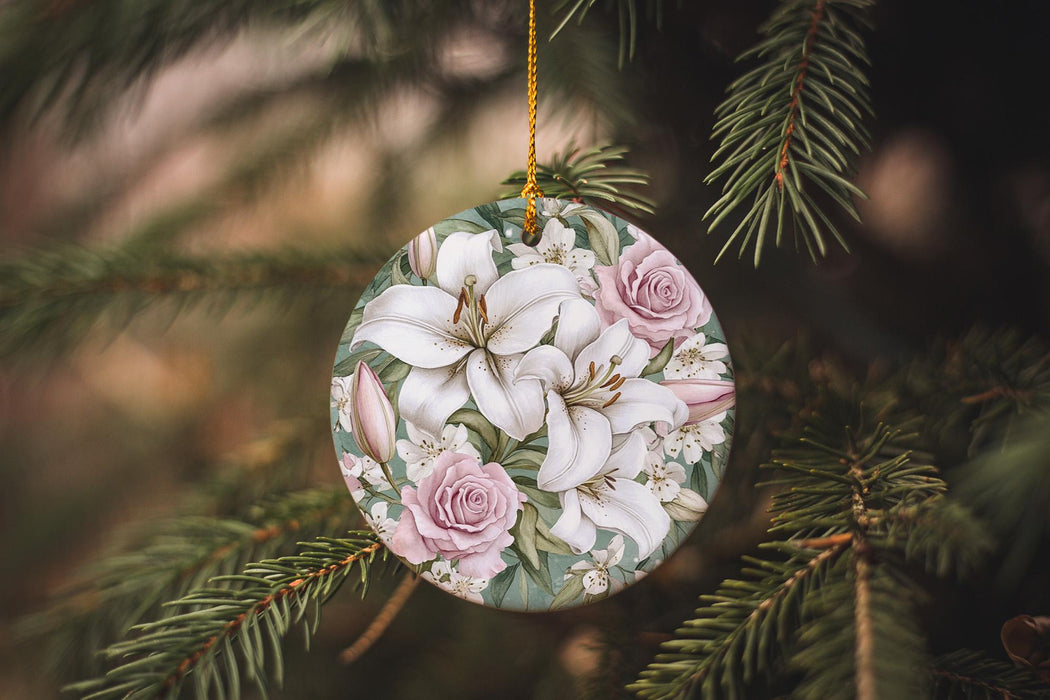 a christmas ornament hanging from a pine tree