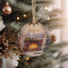 a christmas ornament hanging from a christmas tree