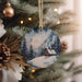 a christmas ornament hanging from a christmas tree