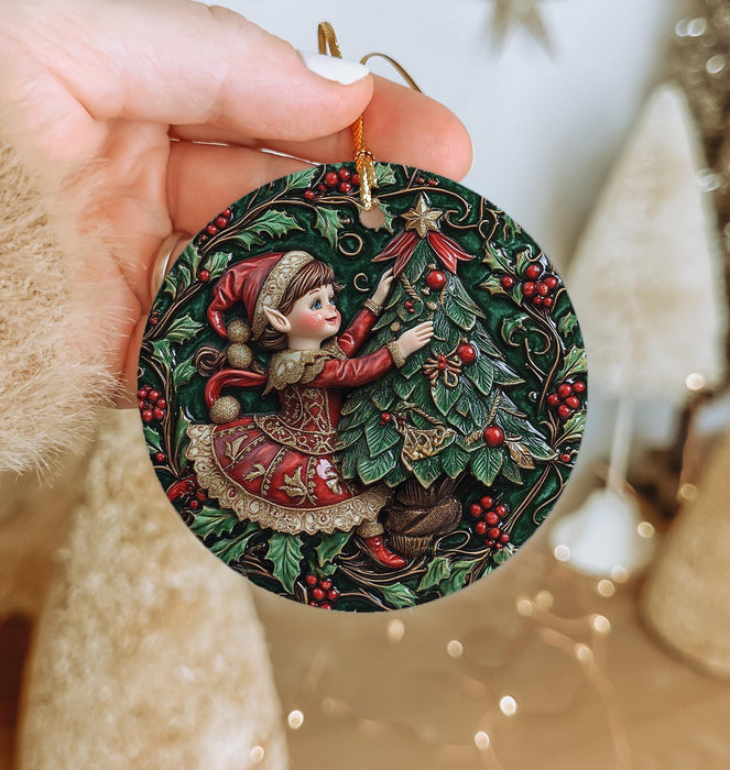 a person holding a christmas ornament in their hand