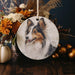 a picture of a dog on a ceramic ornament