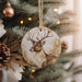 a christmas ornament hanging from a christmas tree