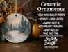 a ceramic ornament with a snowy forest scene