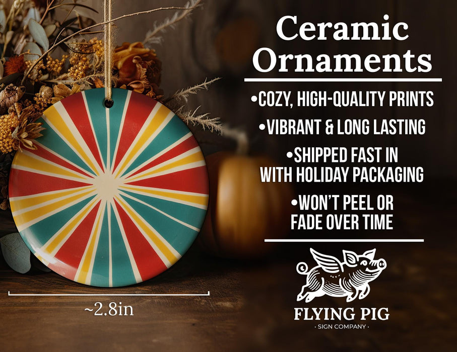 a colorful ceramic ornament sitting on top of a wooden table