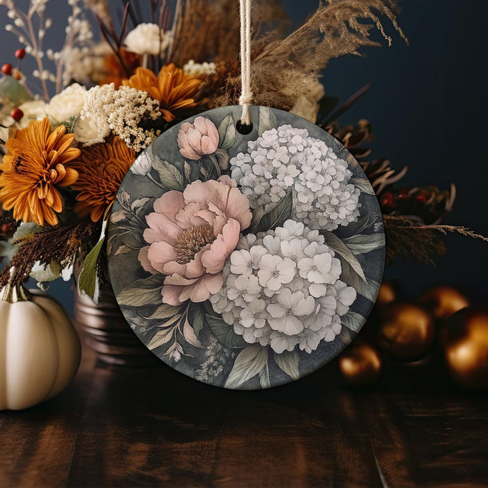 a table topped with a vase filled with flowers