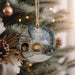 a christmas ornament hanging from a christmas tree