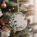 a christmas ornament hanging from a christmas tree