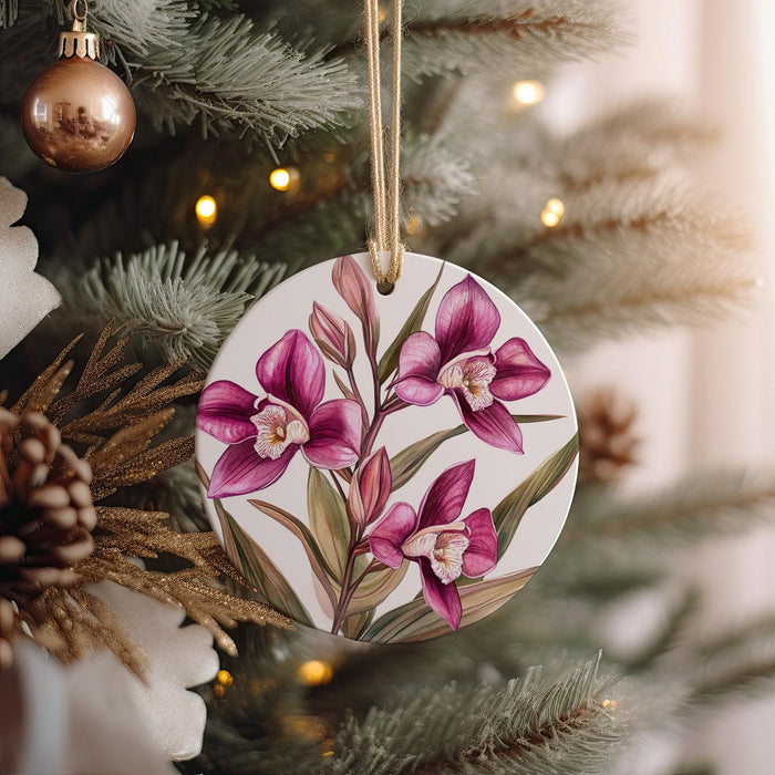 a ceramic ornament hanging from a christmas tree