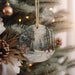 a christmas ornament hanging from a christmas tree