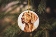 a brown dog ornament hanging from a christmas tree