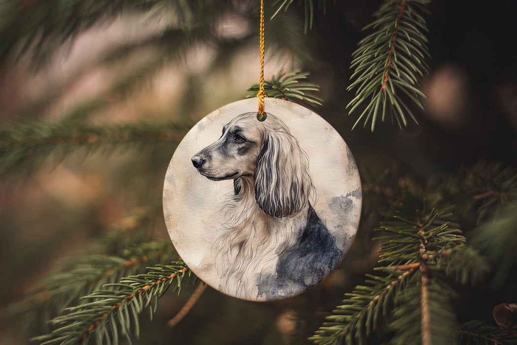 a dog ornament hanging from a christmas tree