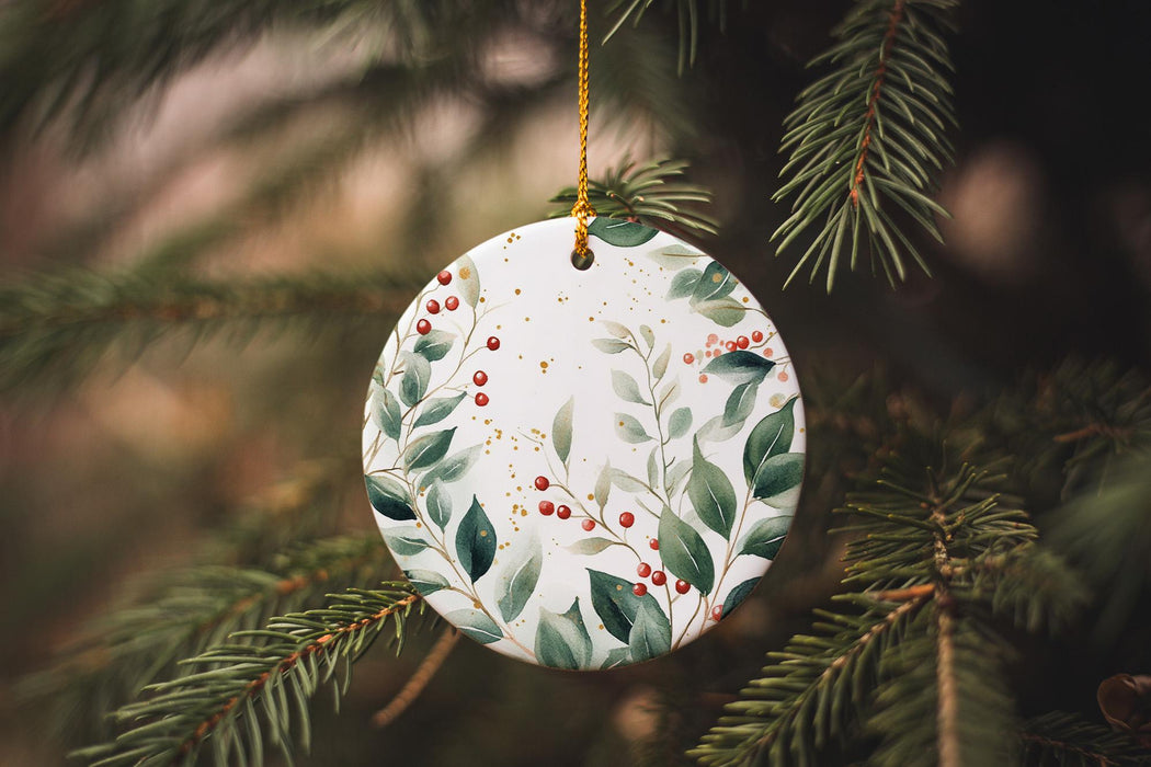 a ceramic ornament hanging from a christmas tree