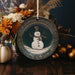 a plate with a picture of a snowman on it