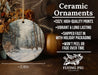 a ceramic ornament with a snowy forest scene