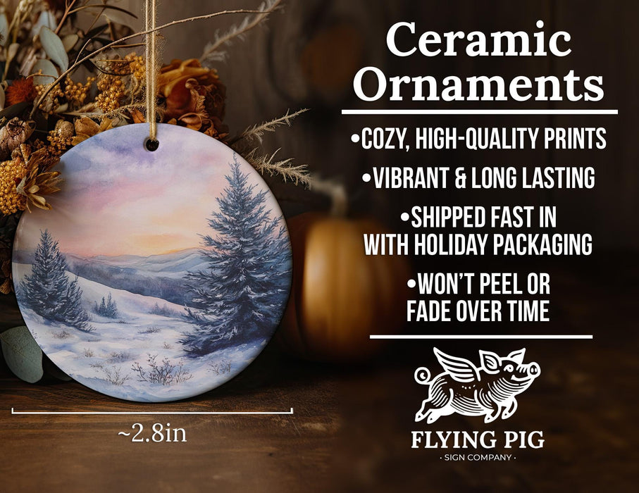 a ceramic ornament with a snowy scene on it