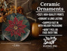 a ceramic ornament with a poinsetti on it