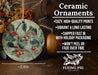 a ceramic ornament with berries and leaves on it
