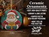 a ceramic ornament with a santa clause holding a present