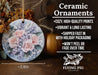 a ceramic ornament with pink roses and baby's breath