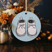 a ceramic ornament with a pair of shoes on it