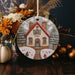 a ceramic ornament with a house on it