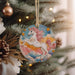 a christmas ornament hanging from a christmas tree