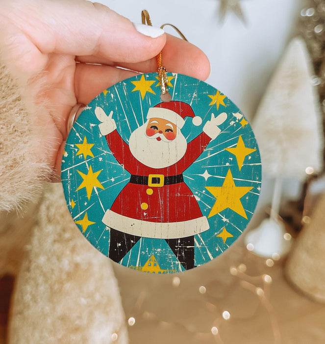 a person holding a christmas ornament in their hand