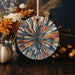 a vase filled with flowers and a decorative plate