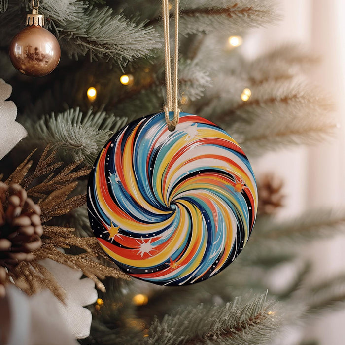 a colorful ornament hanging from a christmas tree