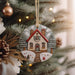 a christmas ornament hanging from a christmas tree
