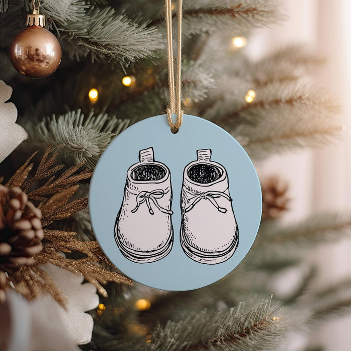 a christmas ornament with a pair of shoes on it