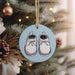 a christmas ornament with a pair of shoes on it