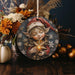 a christmas ornament with a picture of a girl holding a star