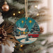 a christmas ornament hanging from a christmas tree