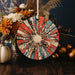 a wooden plate with a colorful design on it