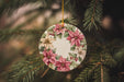 a christmas ornament hanging from a christmas tree
