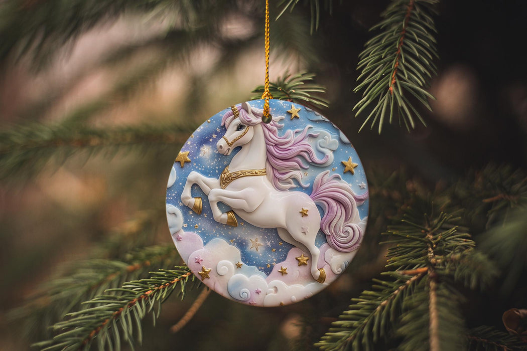 a ceramic ornament hanging from a christmas tree