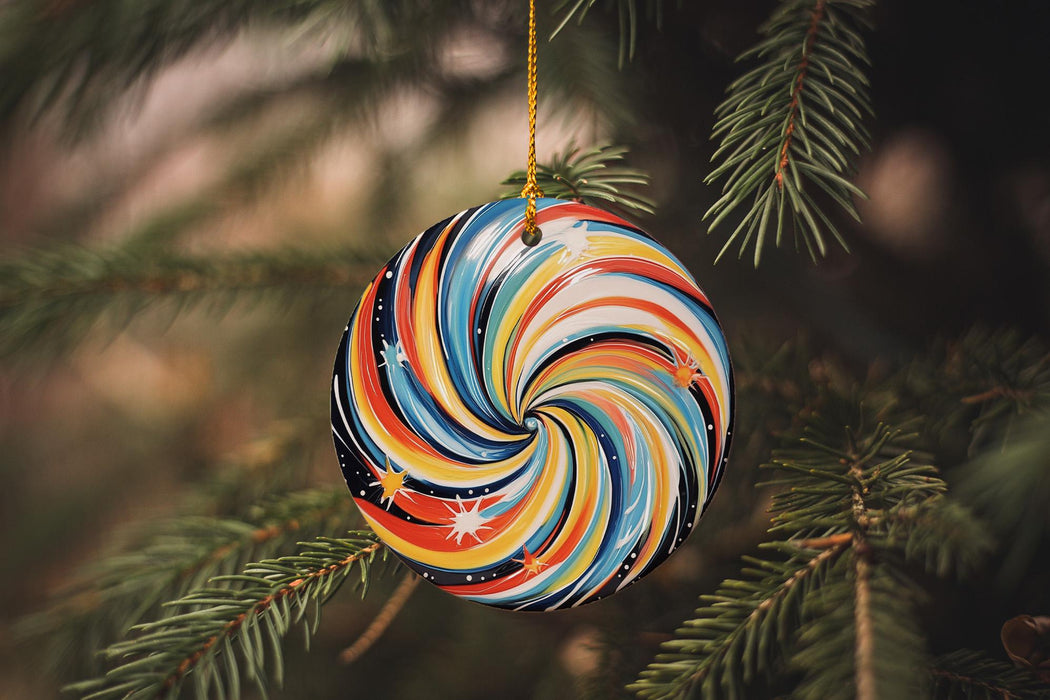 a colorful ornament hanging from a christmas tree