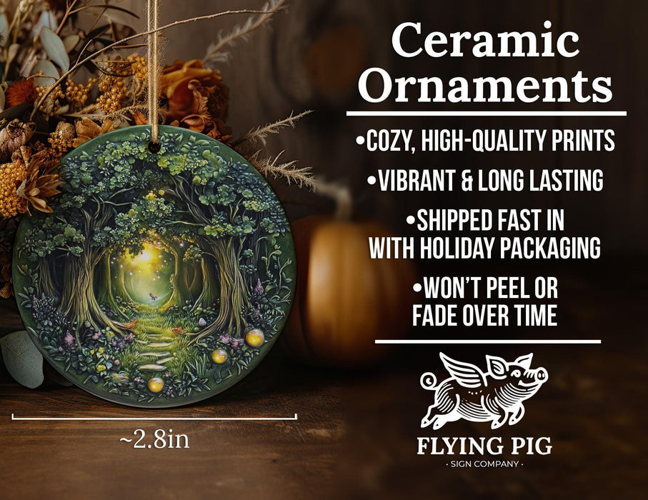 a ceramic ornament with a forest scene on it