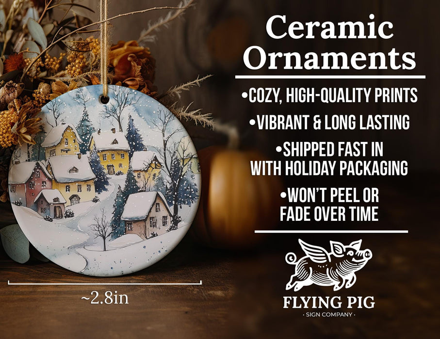 a ceramic ornament with a winter scene on it
