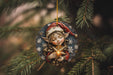 a christmas ornament hanging from a christmas tree