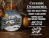 a ceramic christmas ornament with a house in the snow