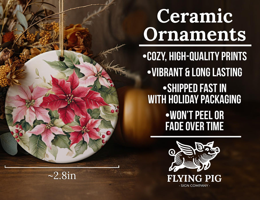 a ceramic ornament with poinsettis on it