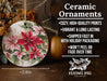 a ceramic ornament with poinsettis on it